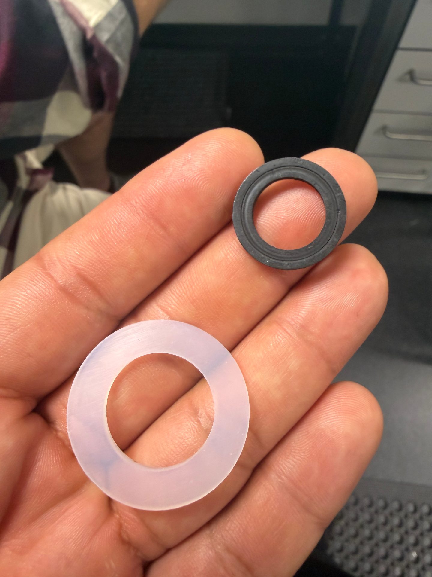 Consumer product prototype components — elastomeric seal and polymer spacer