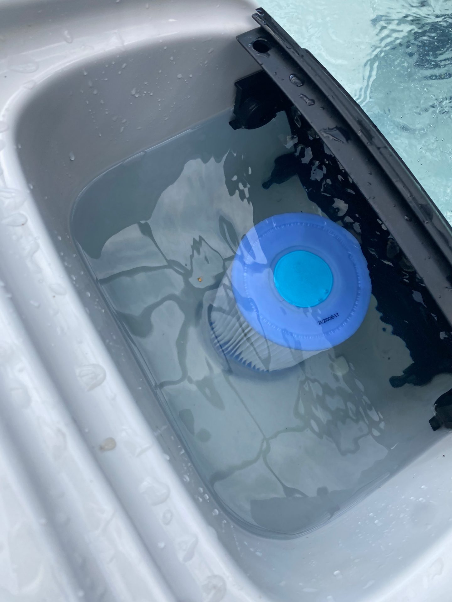 3D-printed spa filter adaptor in service, submerged in the spa